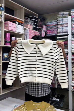 🧶 Collar & Contrast: Striped Button-Down Sweater Collection